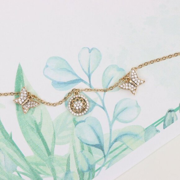 "Dainty Rose Gold Butterfly & Floral Charm Bracelet, XPBL0761 - Picture 1 of 12